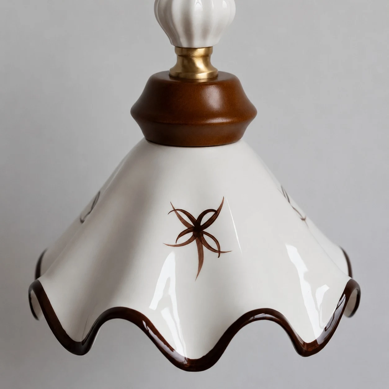hand-painted scalloped ceramic shade detail