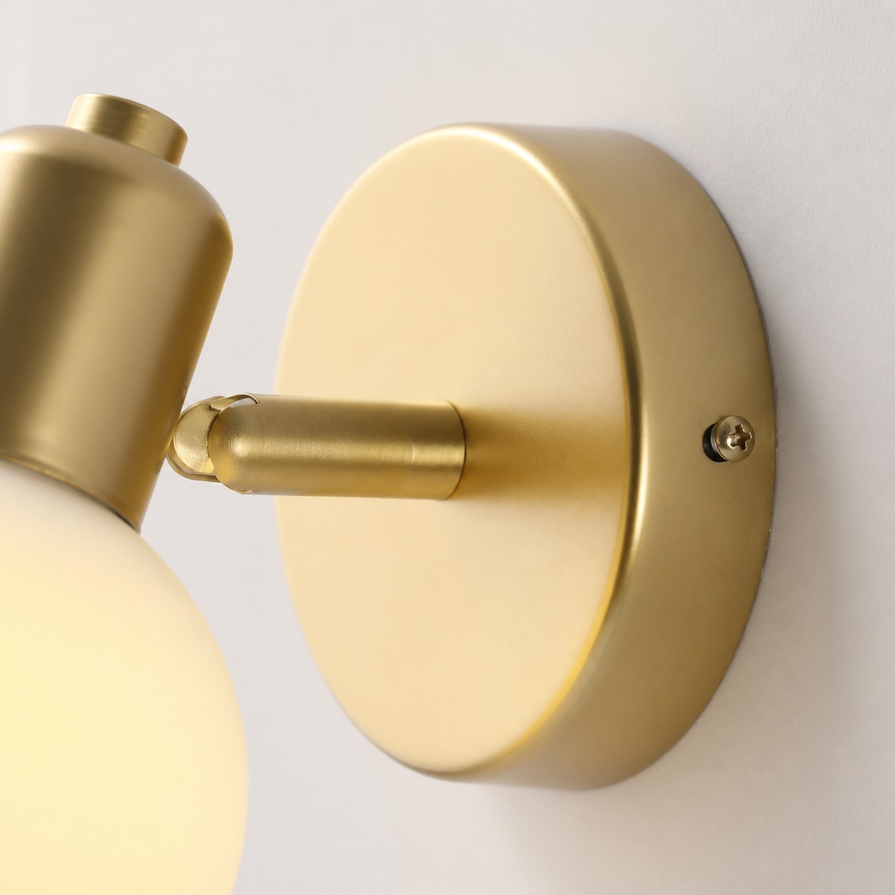 Goldene runde Wandplatte und Befestigungsverbindungsdetail