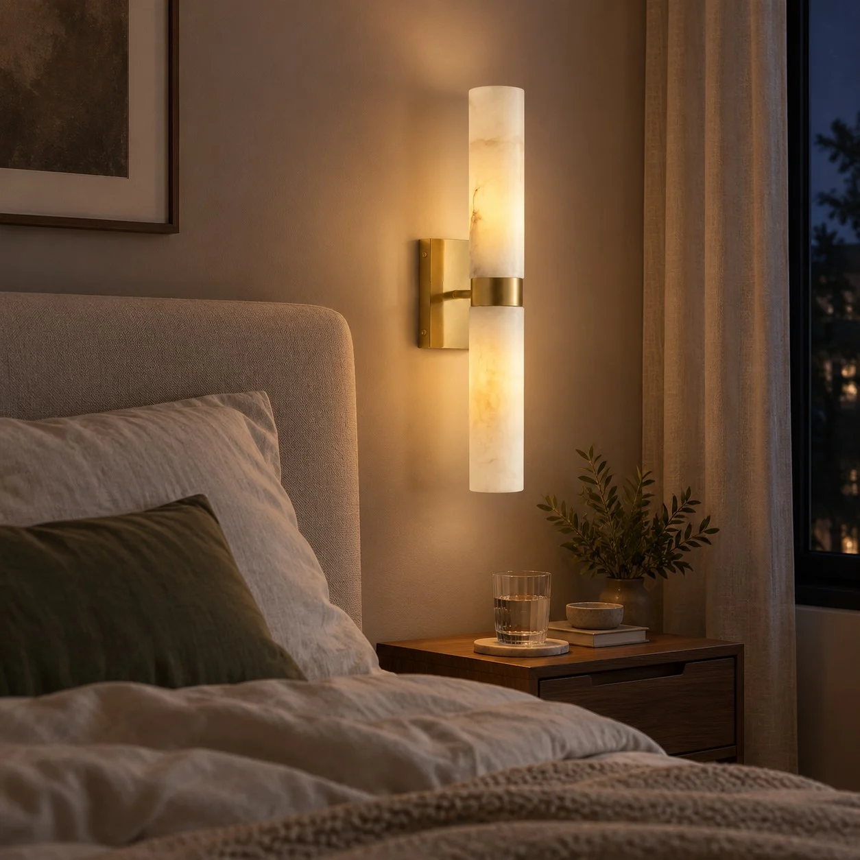 Double-tube wall sconce installed beside a bed
