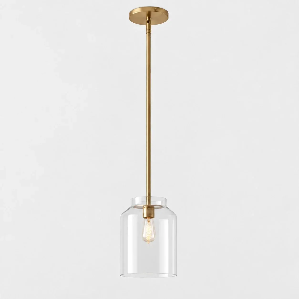 10.75 inch clear glass pendant with antique brass stem