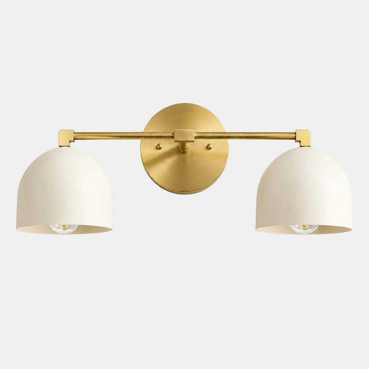 Two-light white shade with raw brass arm