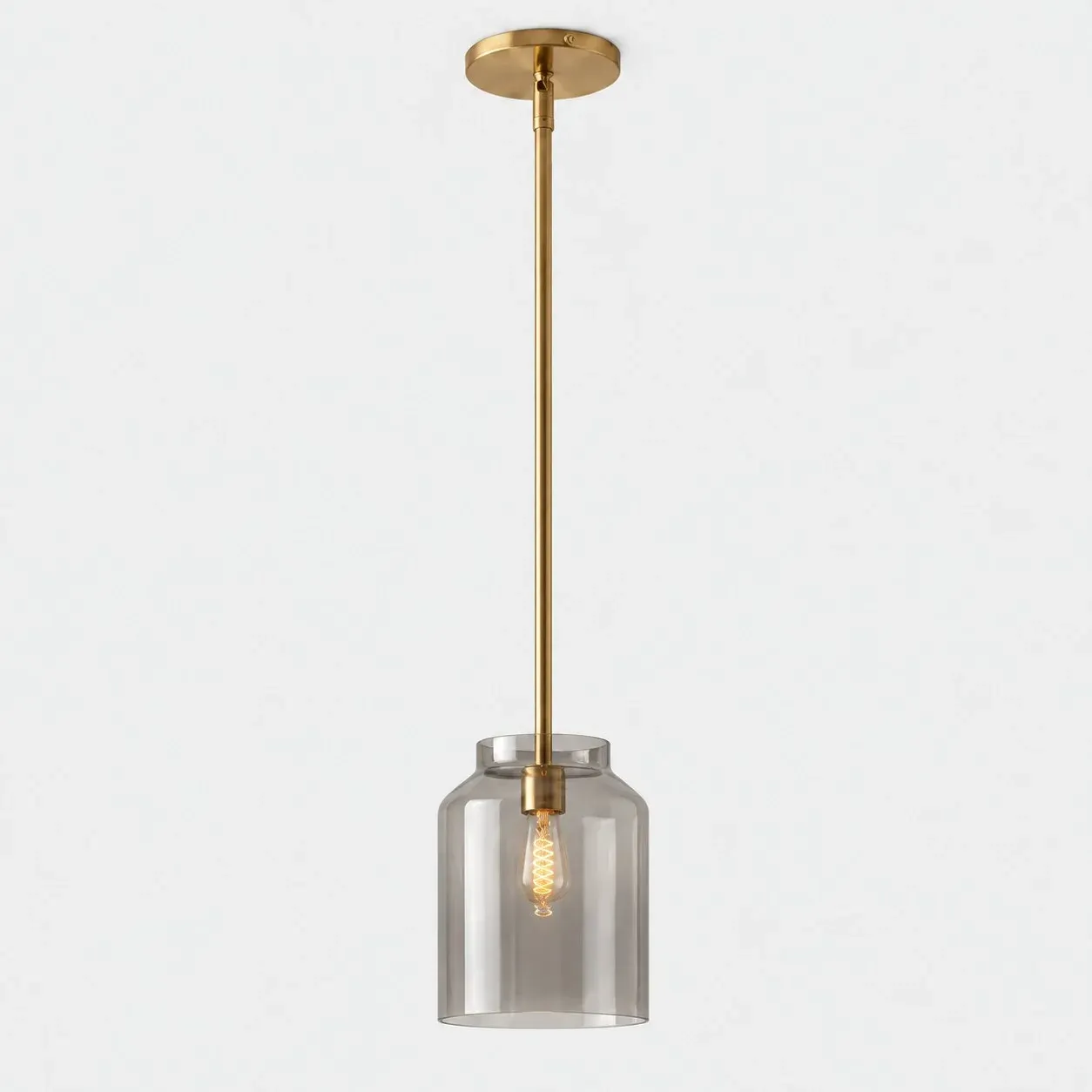 10.75 inch smoke glass pendant with antique brass stem