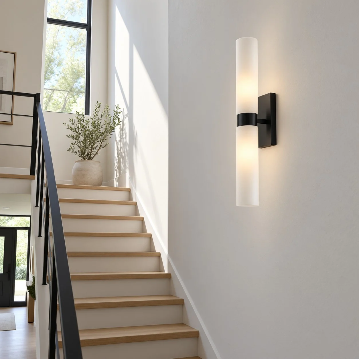 Frosted glass wall sconce on a stair wall