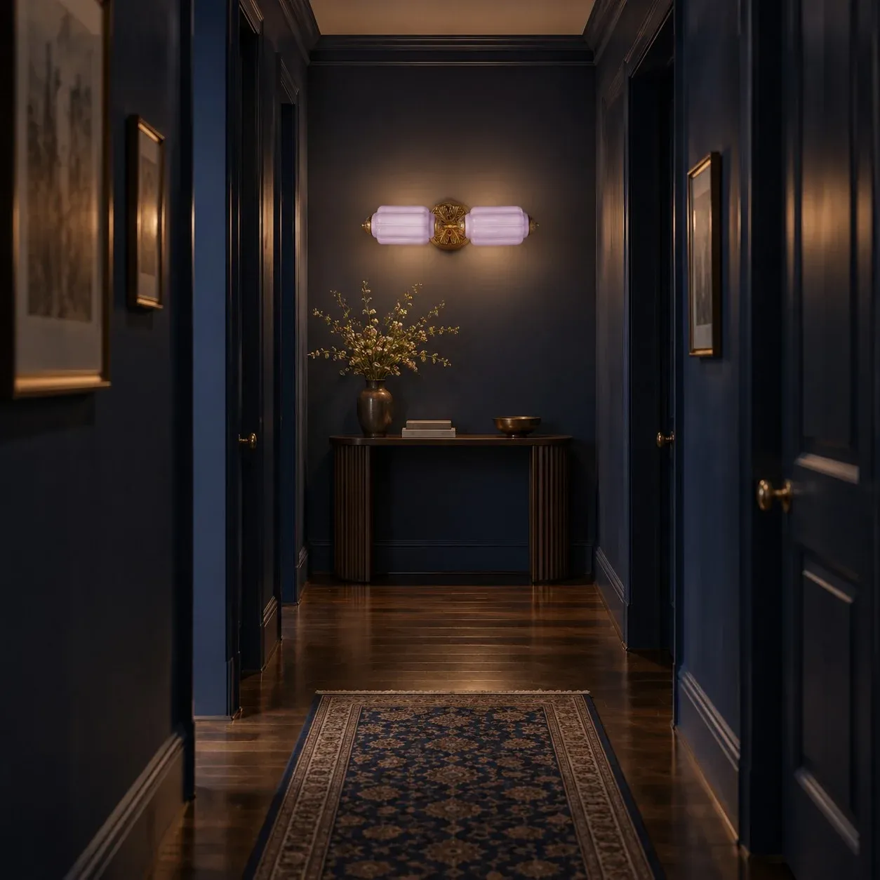 Pink and black wall light in a hallway