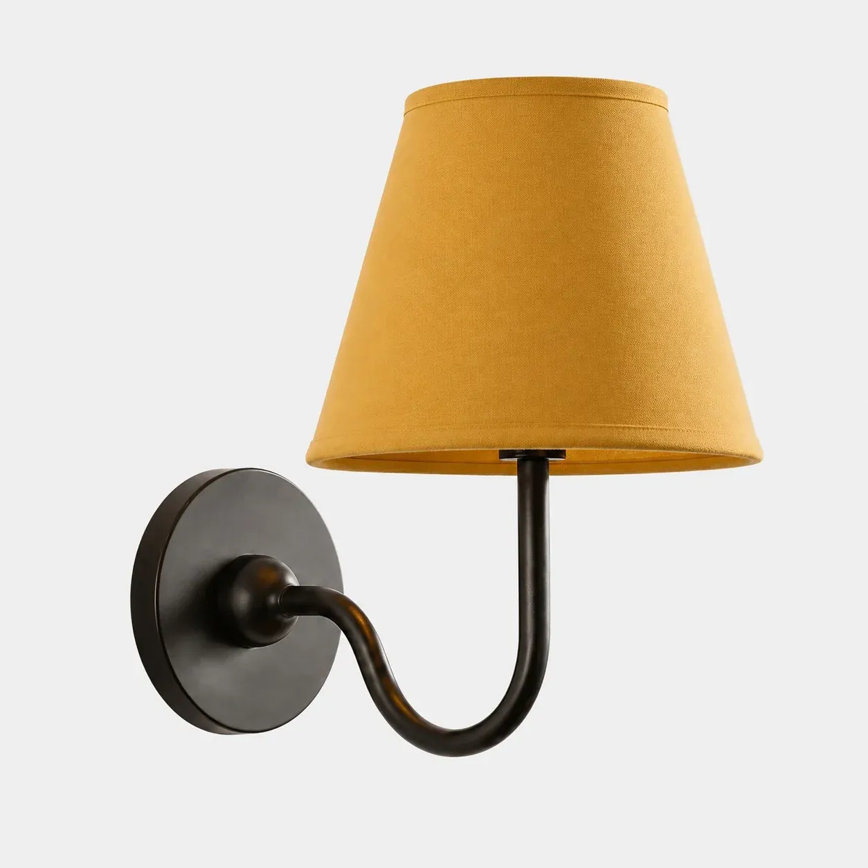 One-head matte black wall sconce with a mustard yellow plain fabric shade