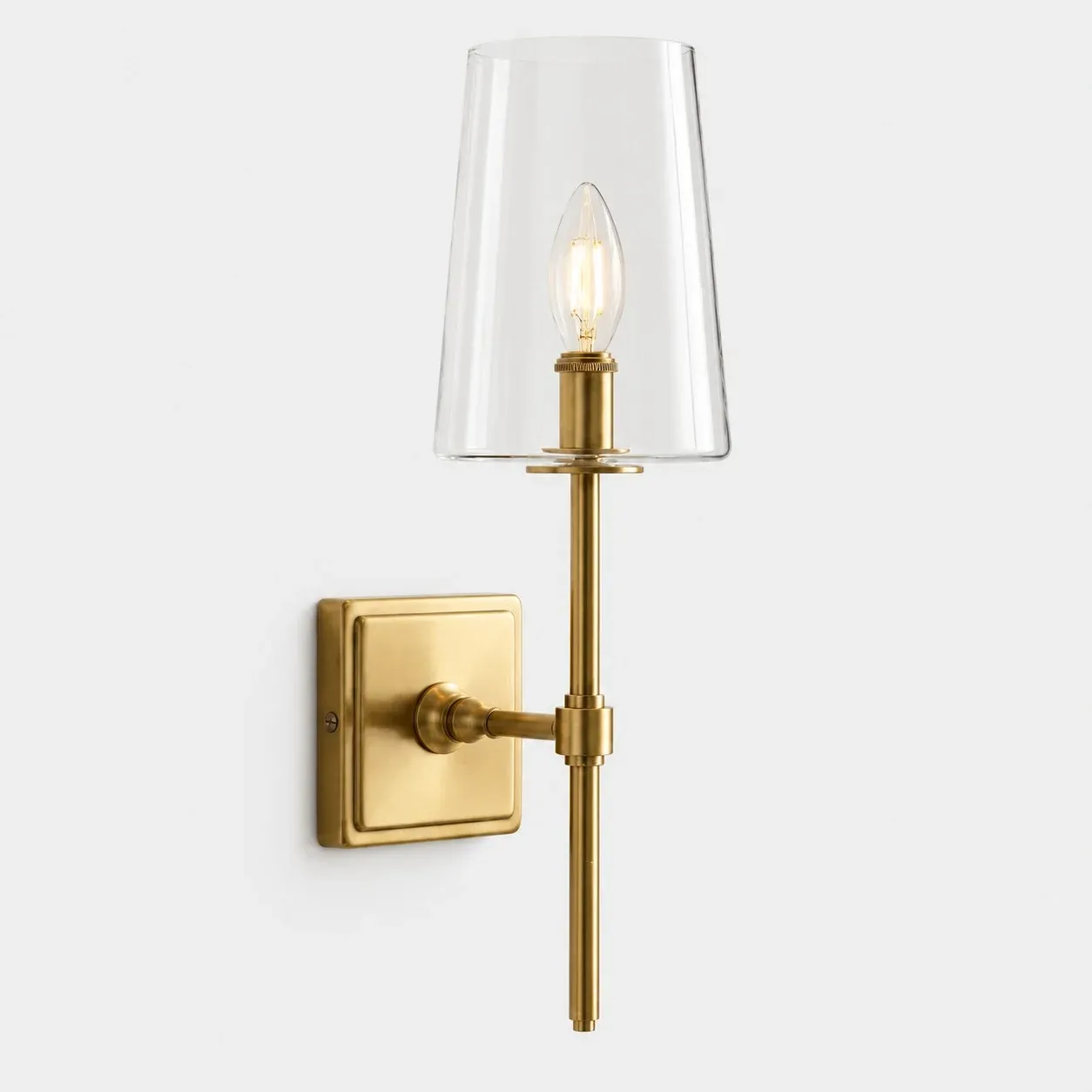 Brass clear glass wall sconce with one upward glass cup