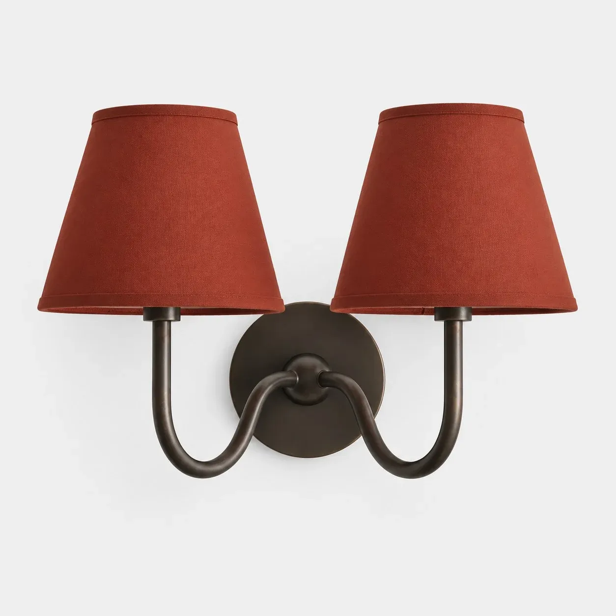 Two-head matte black wall sconce with a red plain fabric shade
