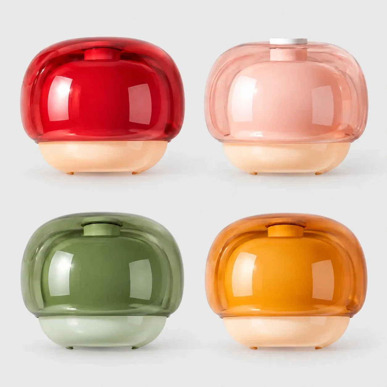 Four glass mushroom wall sconces in burgundy, blush, green, and orange