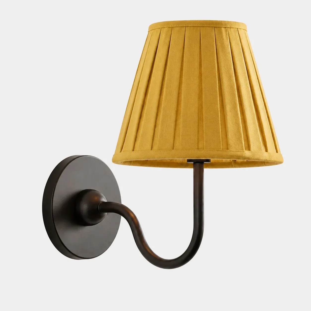 One-head matte black wall sconce with a mustard yellow pleated fabric shade