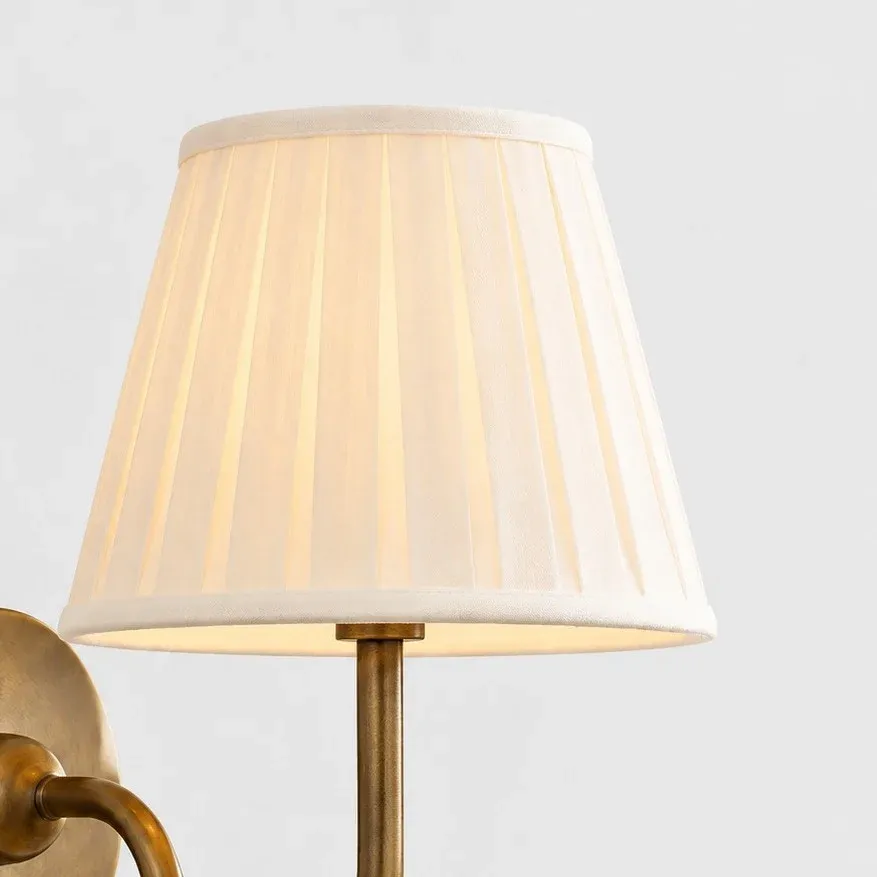 Lit pleated fabric drum shade
