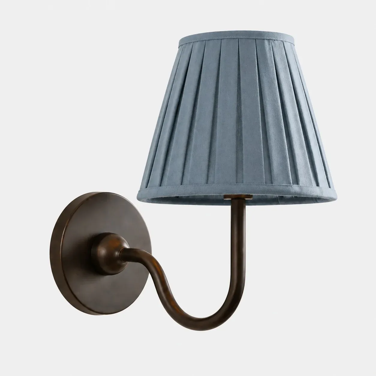 One-head matte black wall sconce with a dusty blue pleated fabric shade