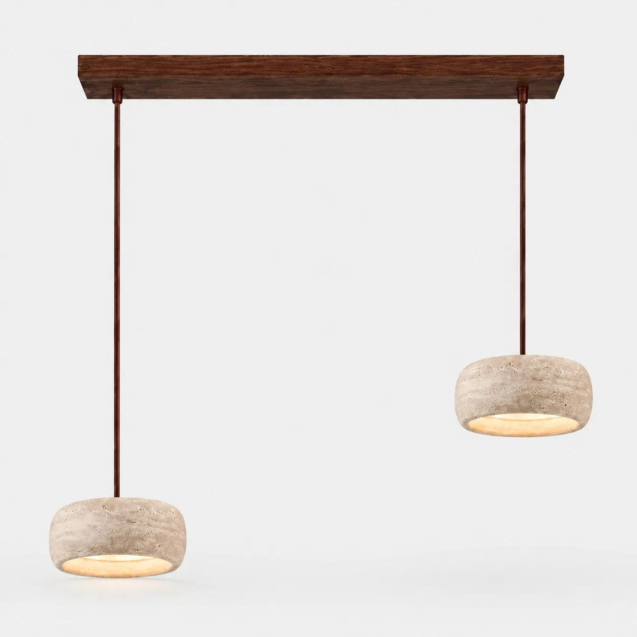 Two small rounded travertine pendants