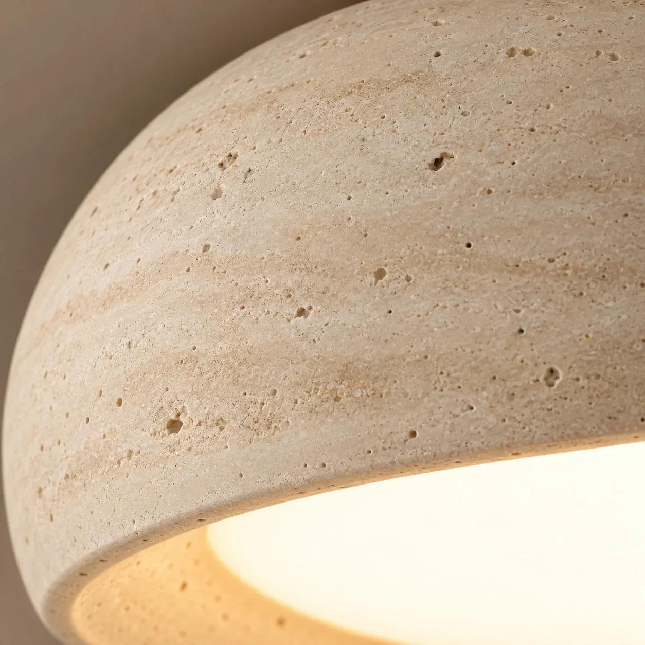 Close view of travertine pores along the bowl edge