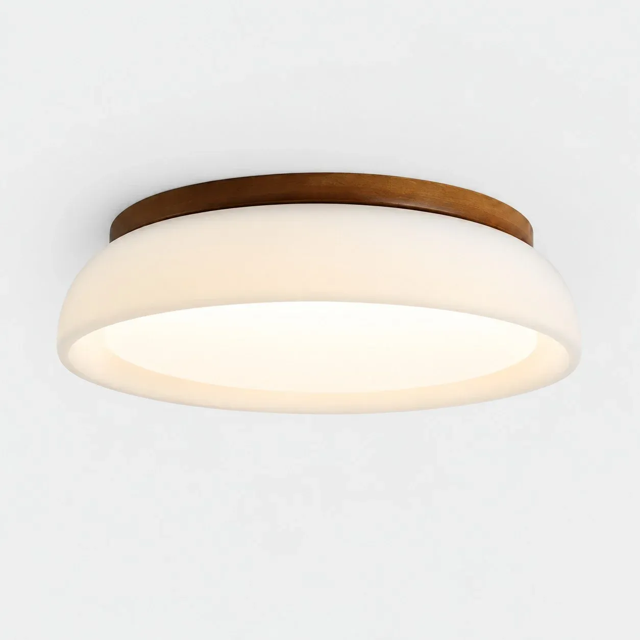 Frosted glass flush mount with a wood ring