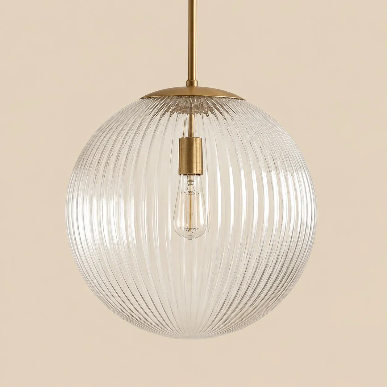 Ribbed glass globe pendant in Brass