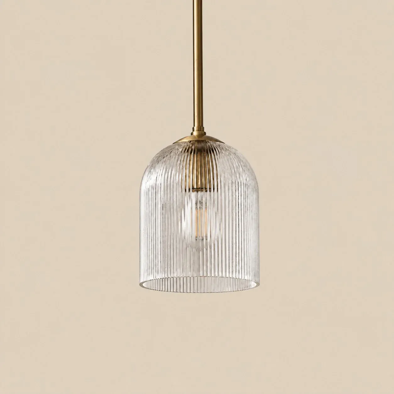 Small ribbed glass bell pendant in Brass
