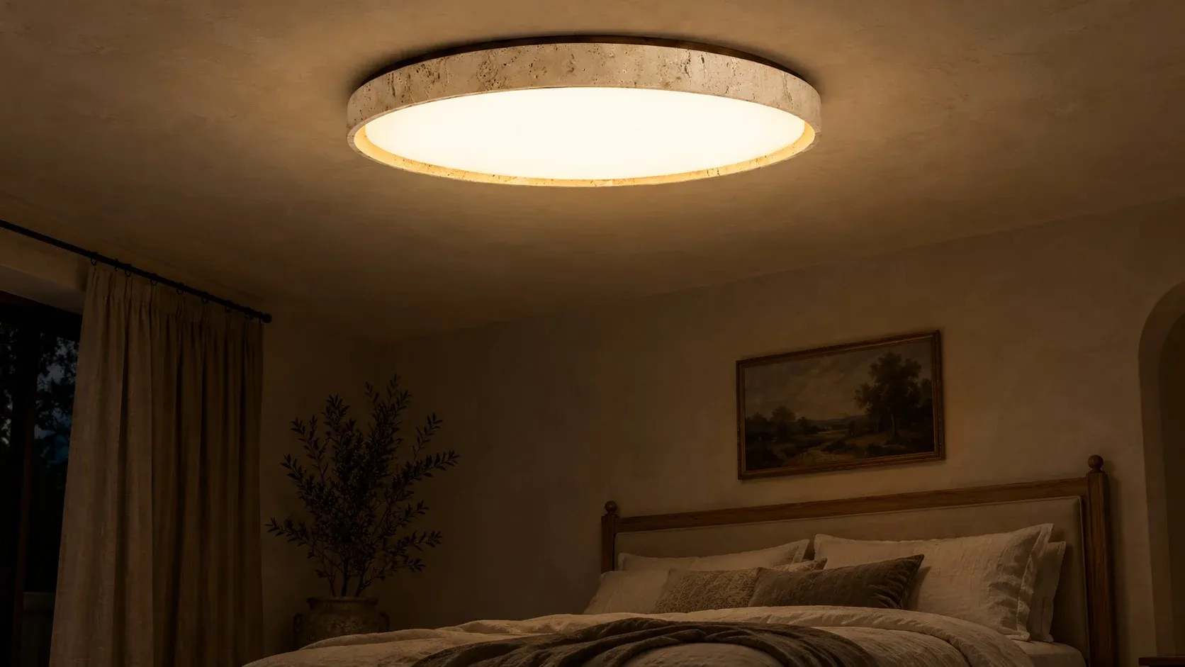 Wood Color travertine flush mount glowing over a bed at night