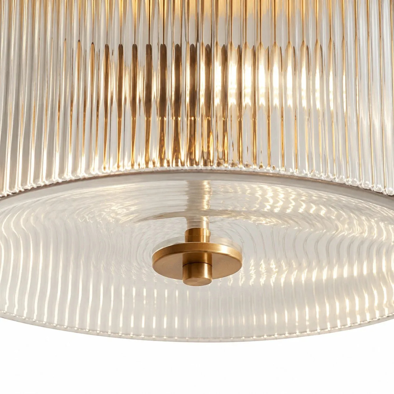 Wavy glass bottom with a brass center fitting