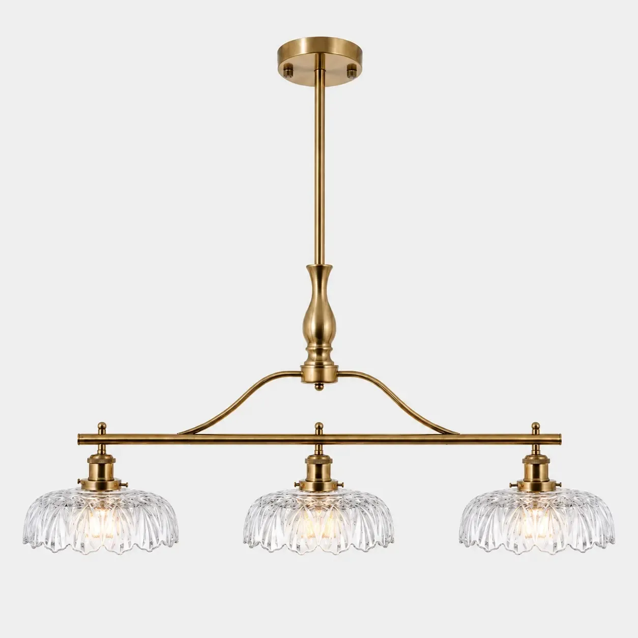 Brass Gold linear chandelier with three fluted glass shades