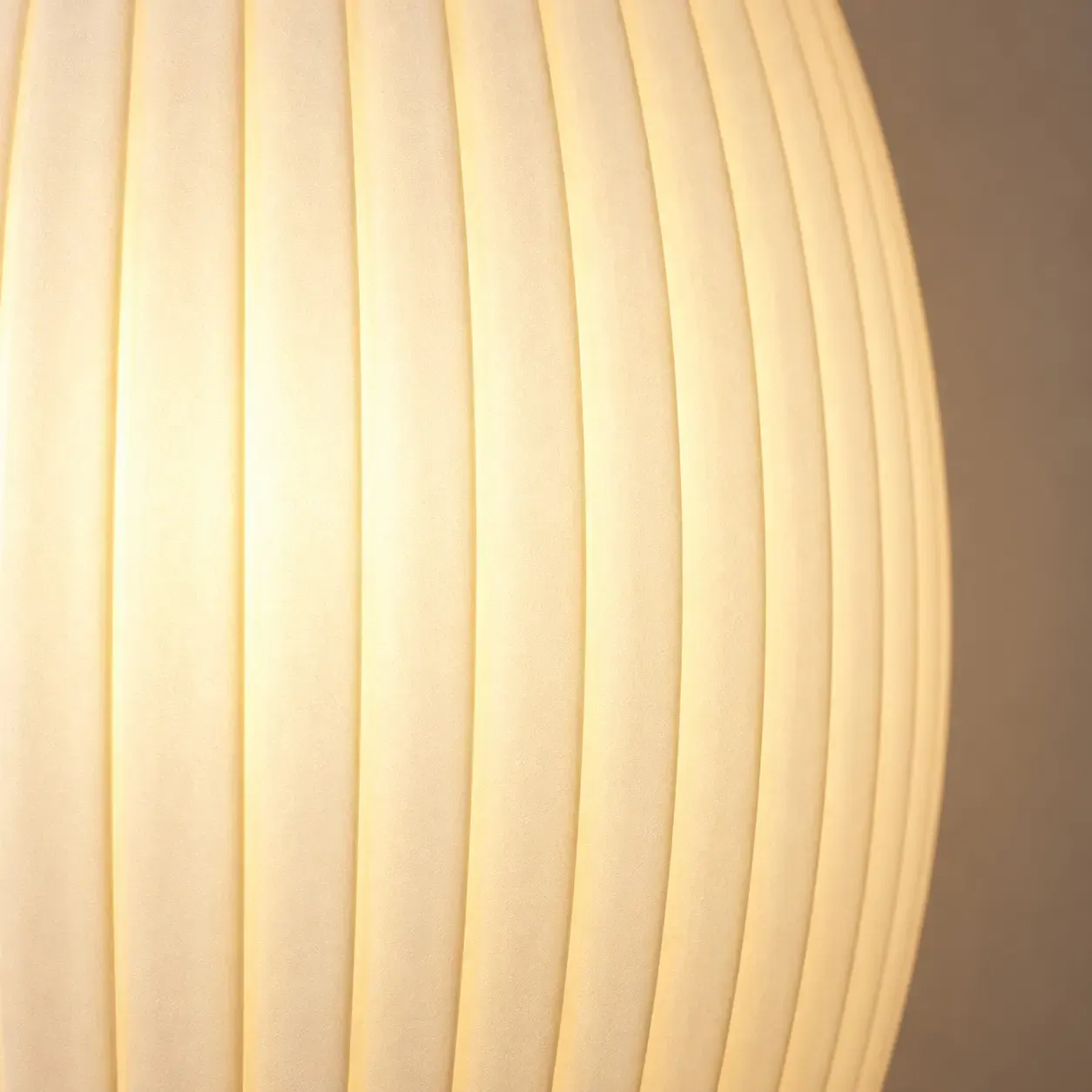 Close view of vertical ribs on the lit polymer shade