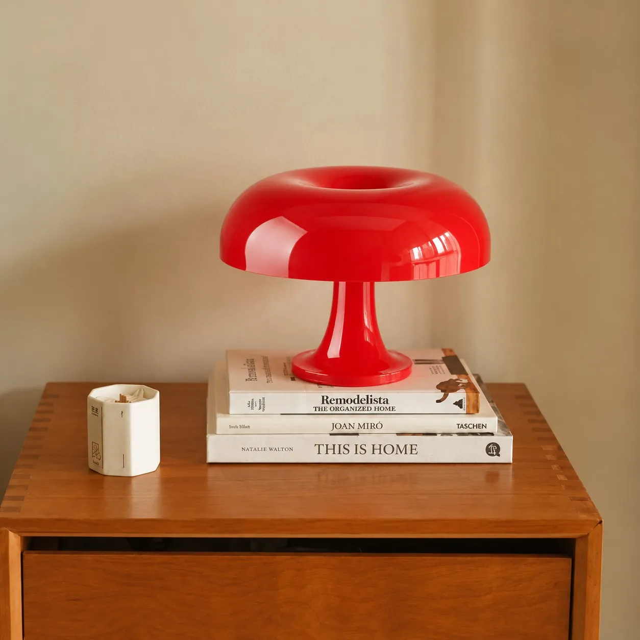 Red lamp on a stack of books