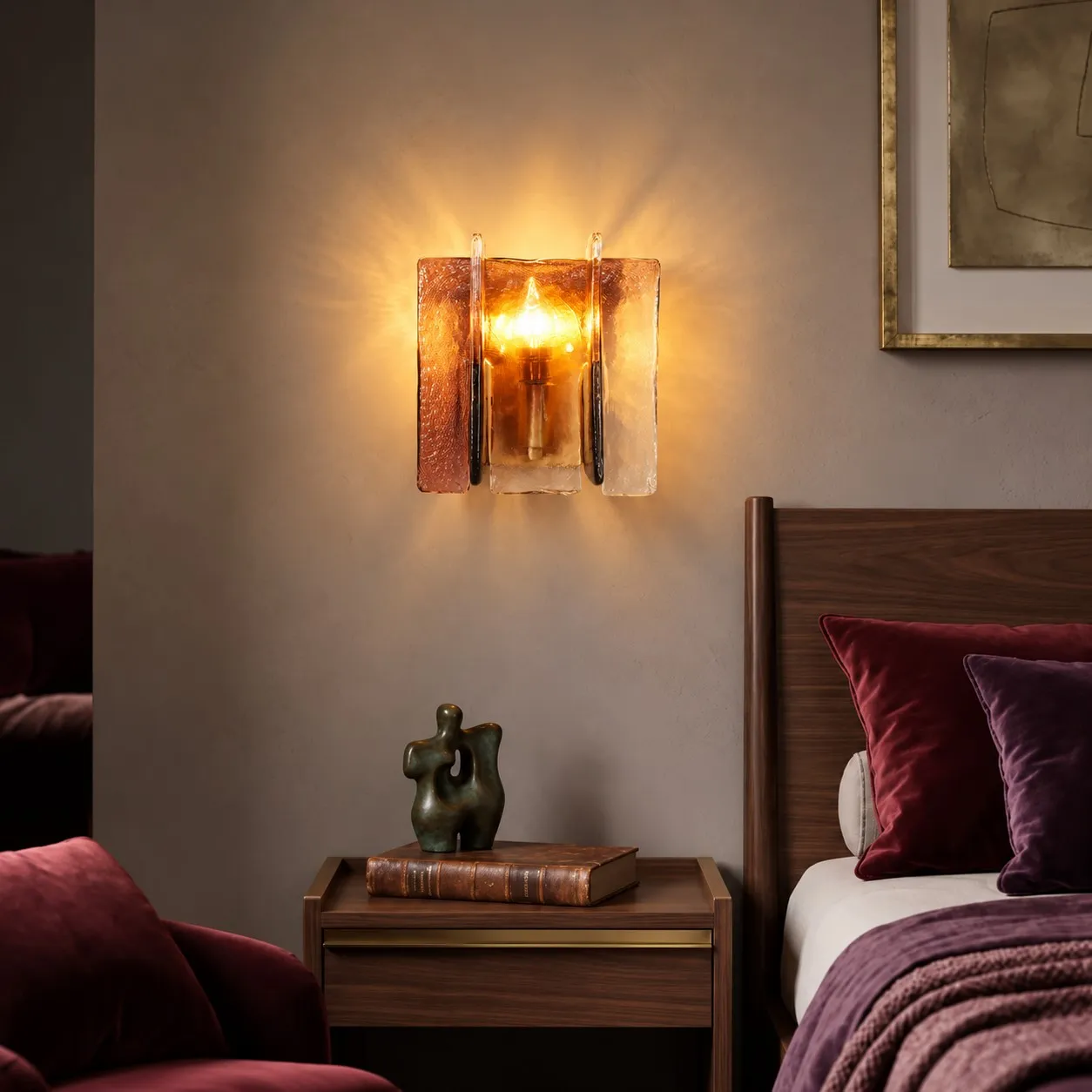 Cognac glass wall light beside a bed