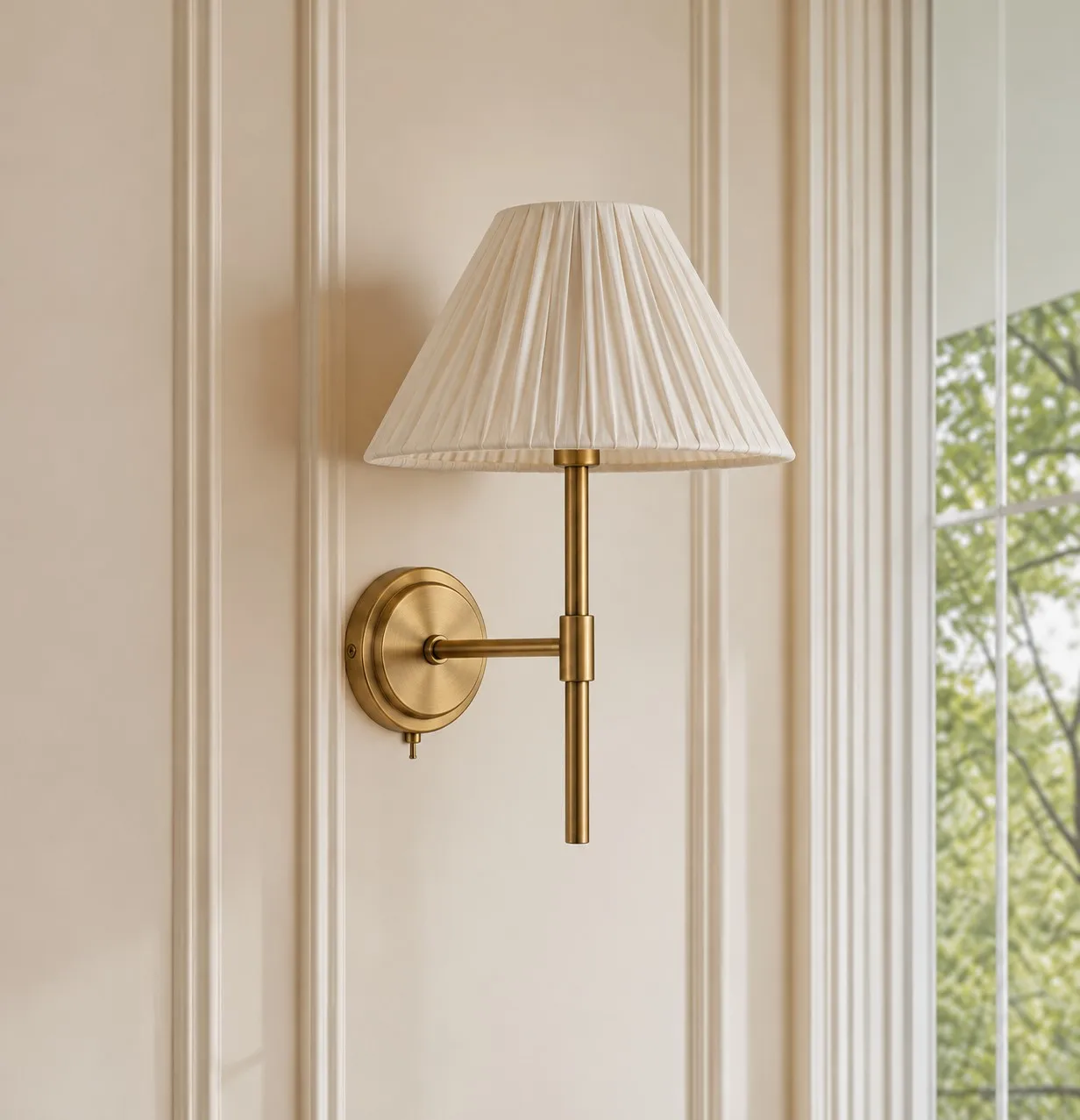 Pleated linen wall light on a paneled wall