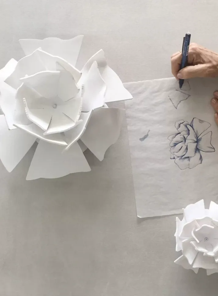 Lotiva lotus form developed from sketch to layered acrylic petals