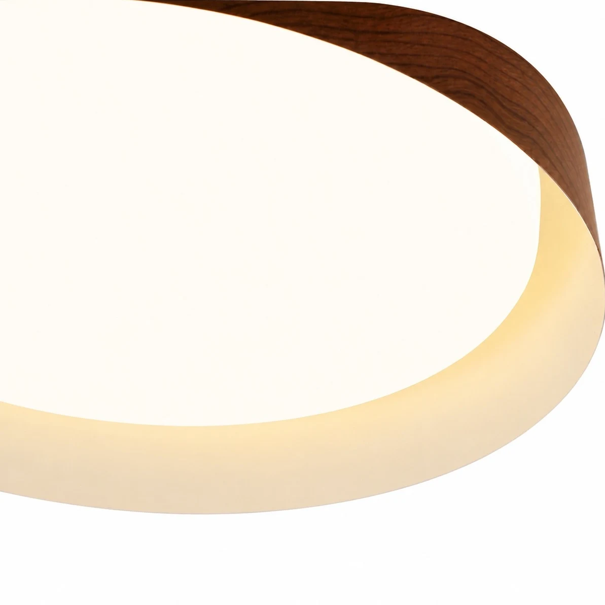 Close view of the wood-grain outer shade and diffuser edge